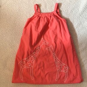 Cute girl’s giraffe sundress.